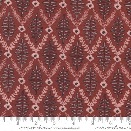 red background with pink and brown floral trellis pattern