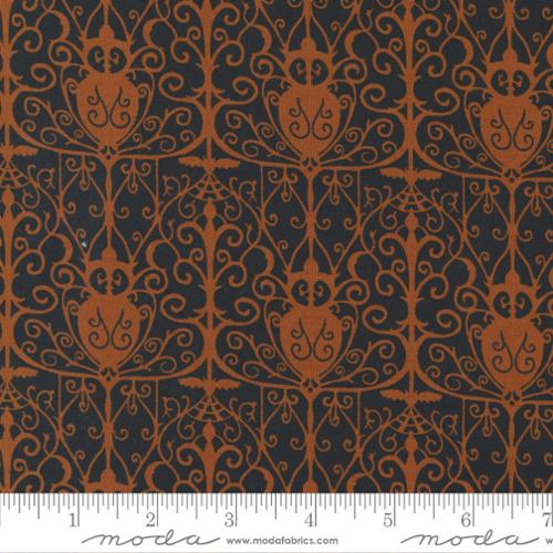 Decorative orange and black damask fabric pattern