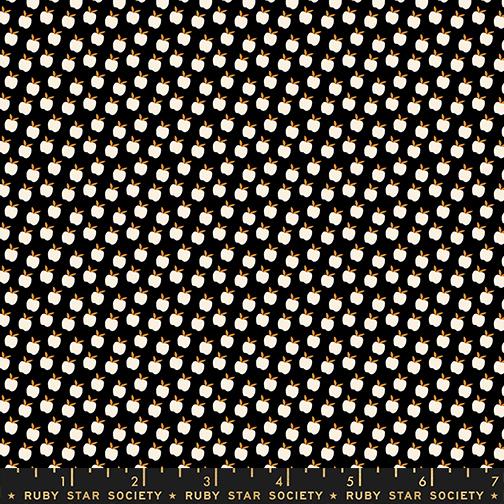 Pattern of apples on a black background with Ruby Star Society branding.