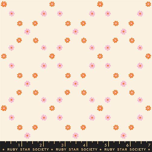 Pink and orange flowers in diamond arrangement on natural background with Ruby Star Society label