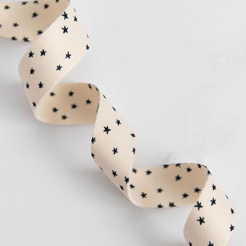 Natural webbing with black stars