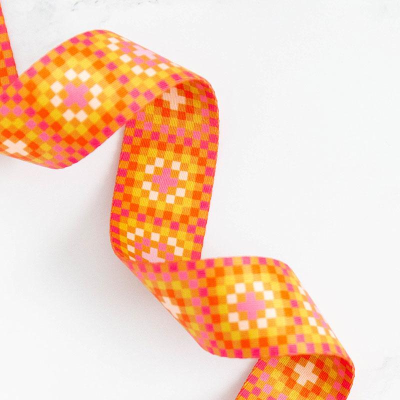 Granny square webbing in shades of orange, red, yellow and white