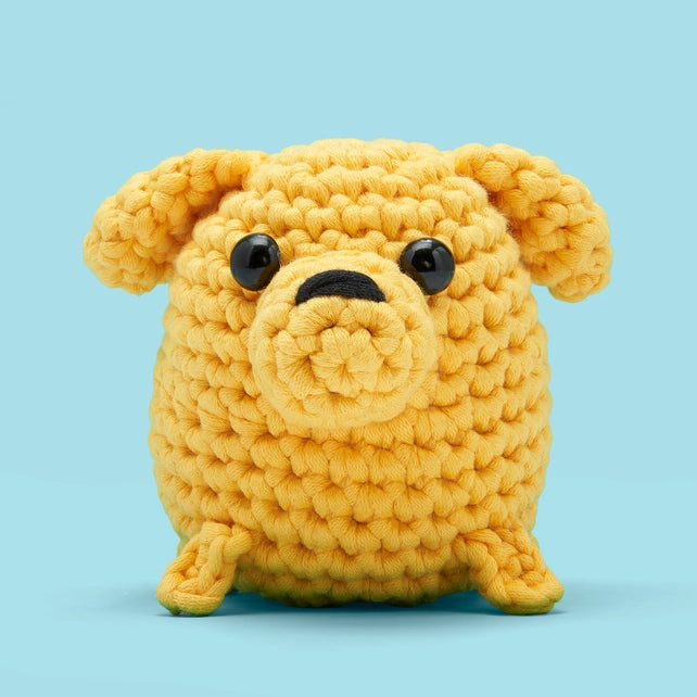 Yellow crocheted dog front view