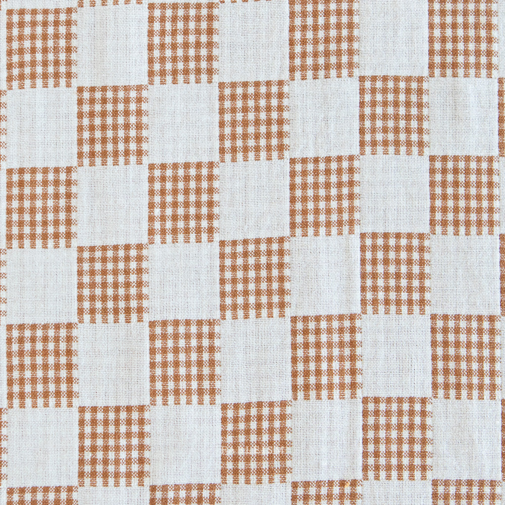 Checkered pattern with brown and white squares