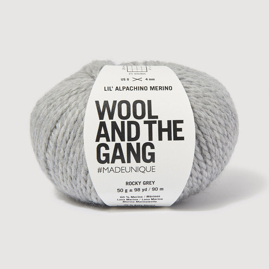 Gray yarn ball with 'Wool and the Gang' label on a white background