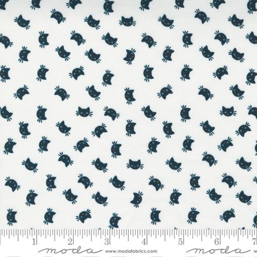 Pattern of black cats on a white background with Moda label at the bottom.