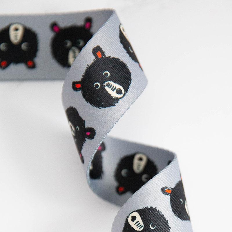 Grey webbing with black bear heads