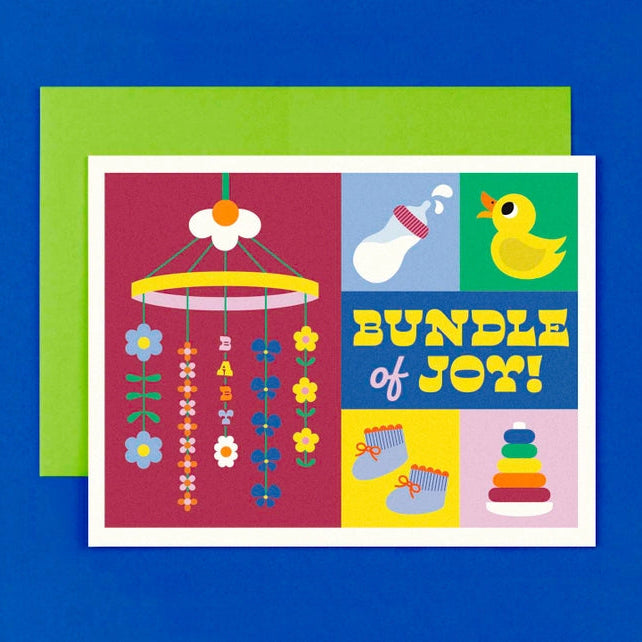 Color block card with 'bundle of joy' and baby accessories