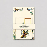 Letter writing set with butterfly designs on a light gray background