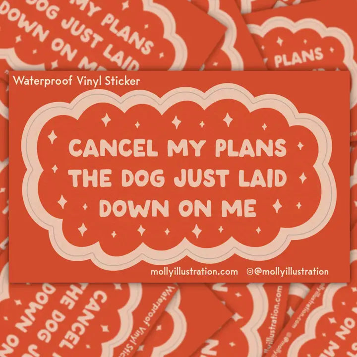Red waterproof vinyl sticker with text 'Cancel my plans the dog just laid down on me' on a matching background.