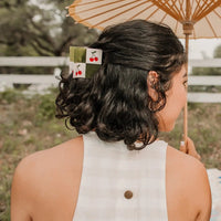 Lady wearing the patchwork cherry hair claw