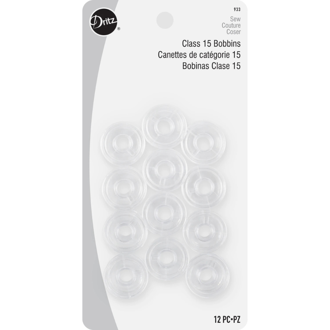 Dritz Class 15 Bobbins packaging with clear bobbin cases on a white background