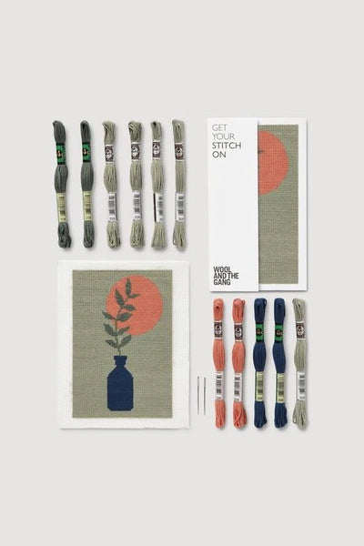 Set of embroidery threads and cards on a white background