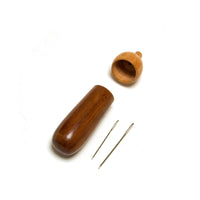 Wooden acorn needle holder with 2 needles