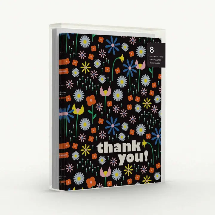 Packaging of 8 folded cards with colorful floral design and 'thank you!' text on a black background.