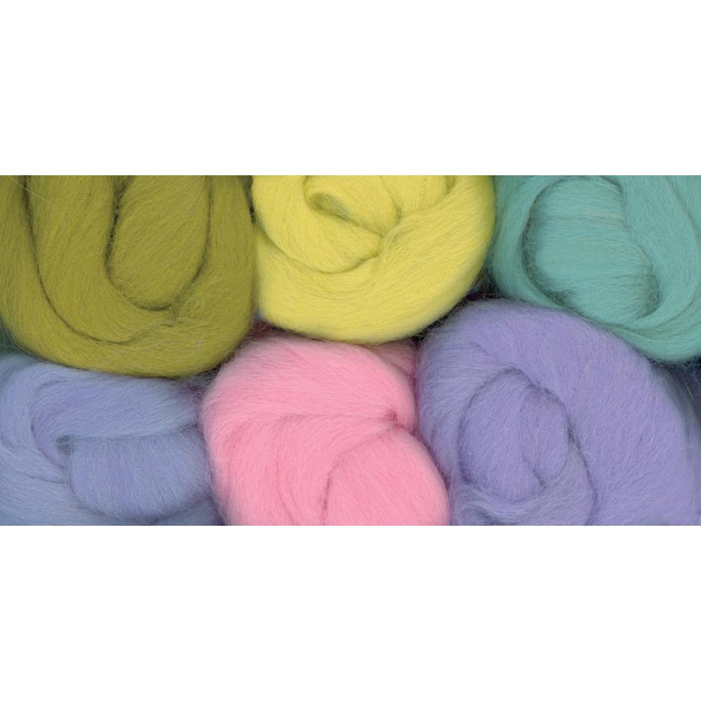 Assorted colorful yarn balls on a white background