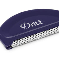 Dritz fabric shaver with purple handle on a white background