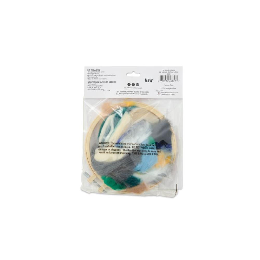Packaged embroidery hoop with a colorful fabric design on a white background