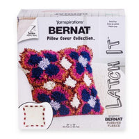 Yarnspirations Bernat Pillow Cover Collection packaging with a colorful pillow design.
