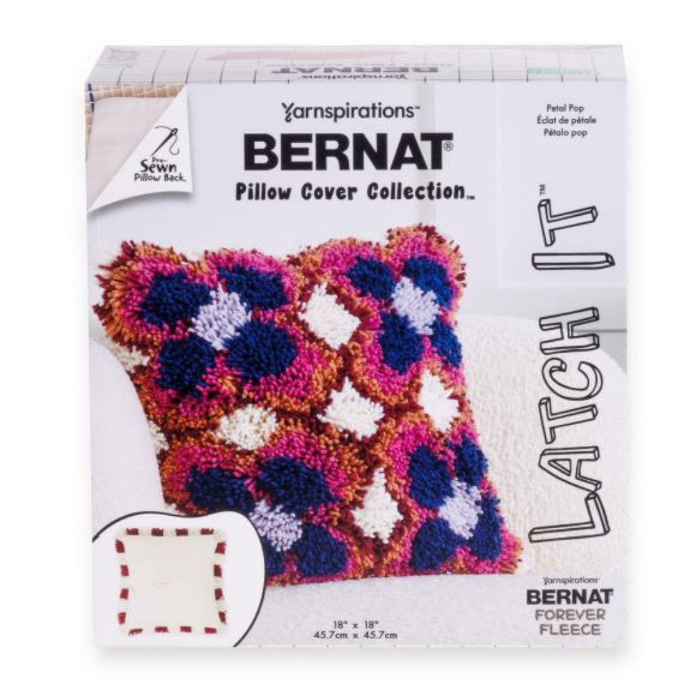 Yarnspirations Bernat Pillow Cover Collection packaging with a colorful pillow design.