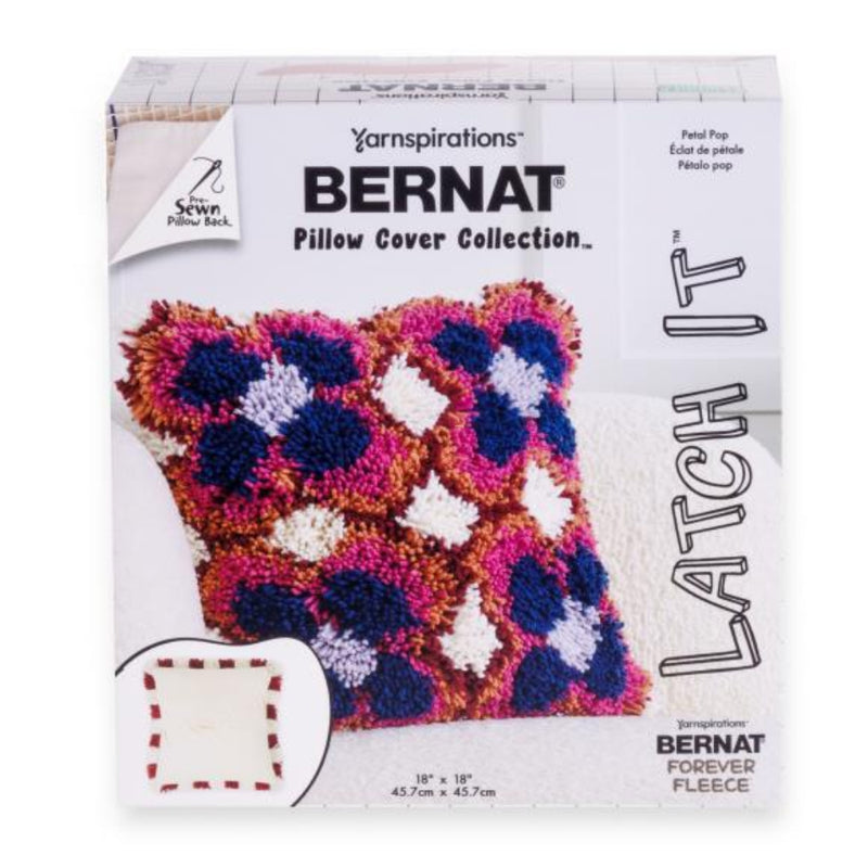 Yarnspirations Bernat Pillow Cover Collection packaging with a colorful pillow design.