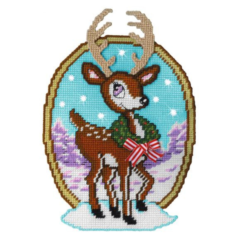 Needlepointed deer with a wreath and bow on a white background