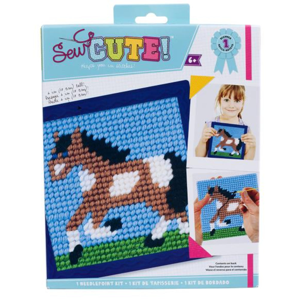Sew Cute needlepoint kit packaging with a horse design and child holding a completed project.