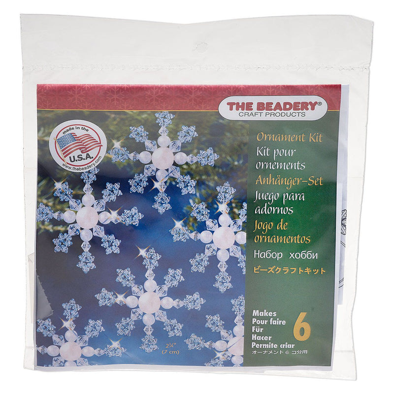 The Beadery craft product packaging with snowflake designs on a blue background