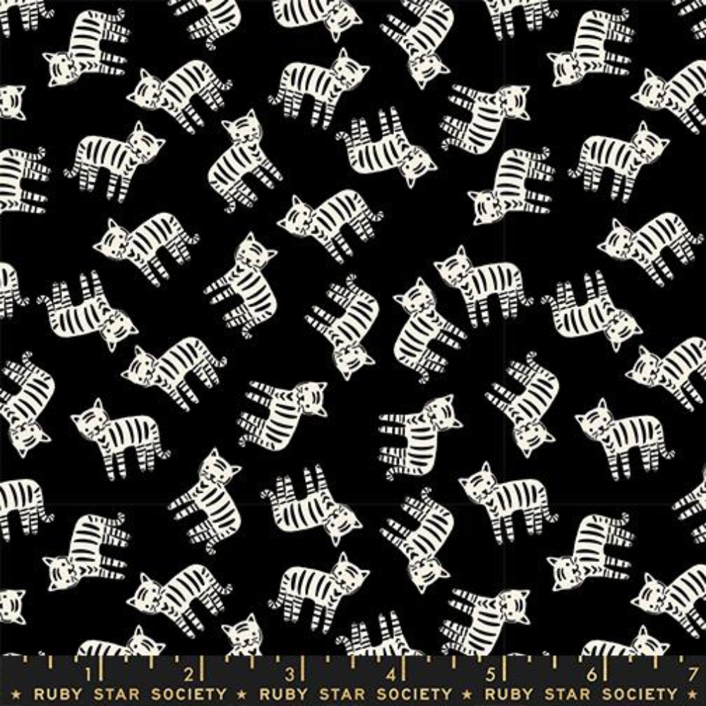 Small white tigers with black stripes on a black background.