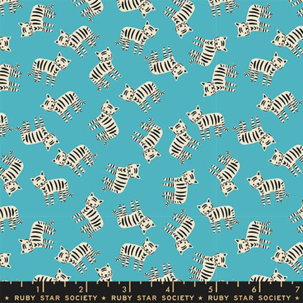 Small white tigers with black stripes on a light blue background.