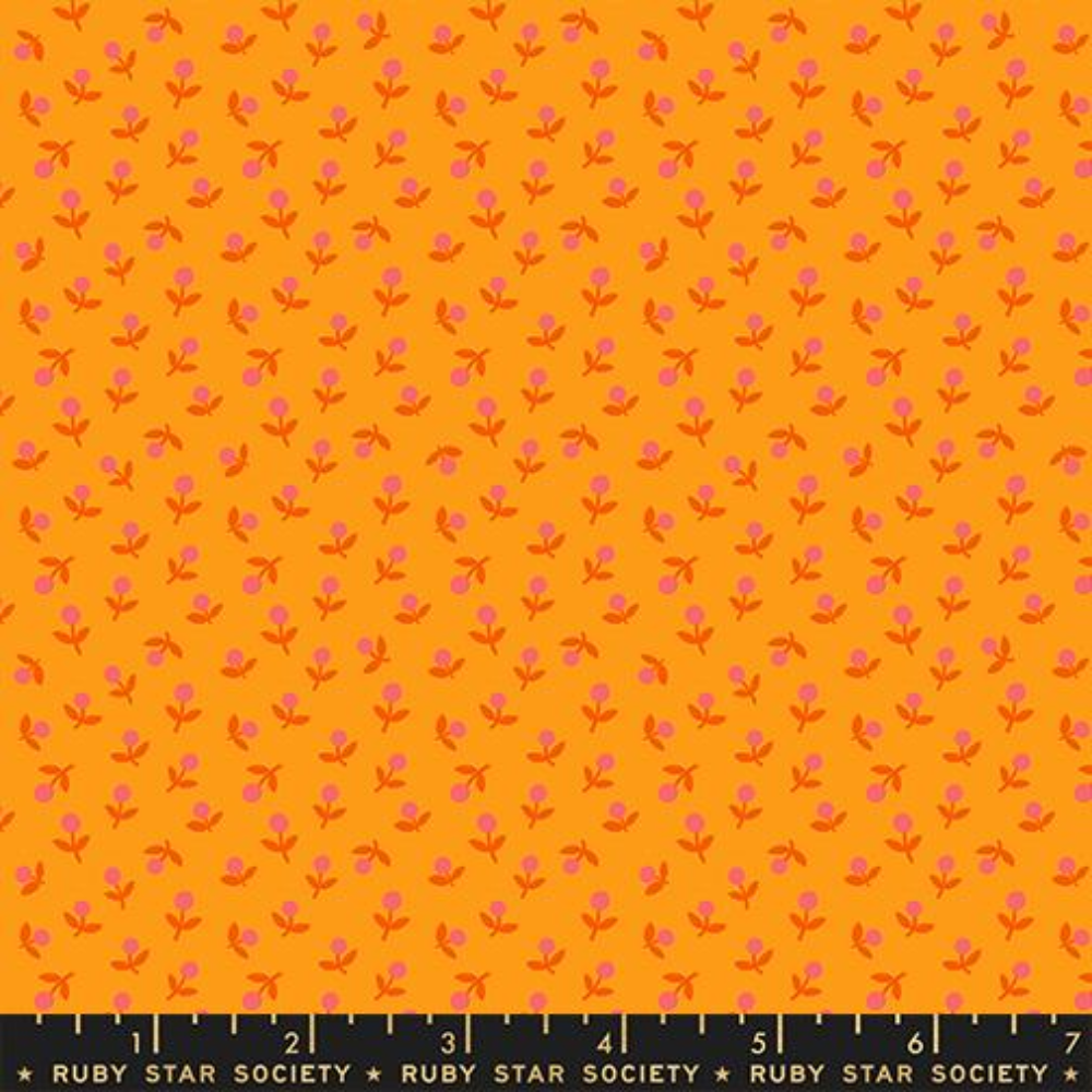 Little pink-petal and red-stemmed flowers are spread out across an orange background.