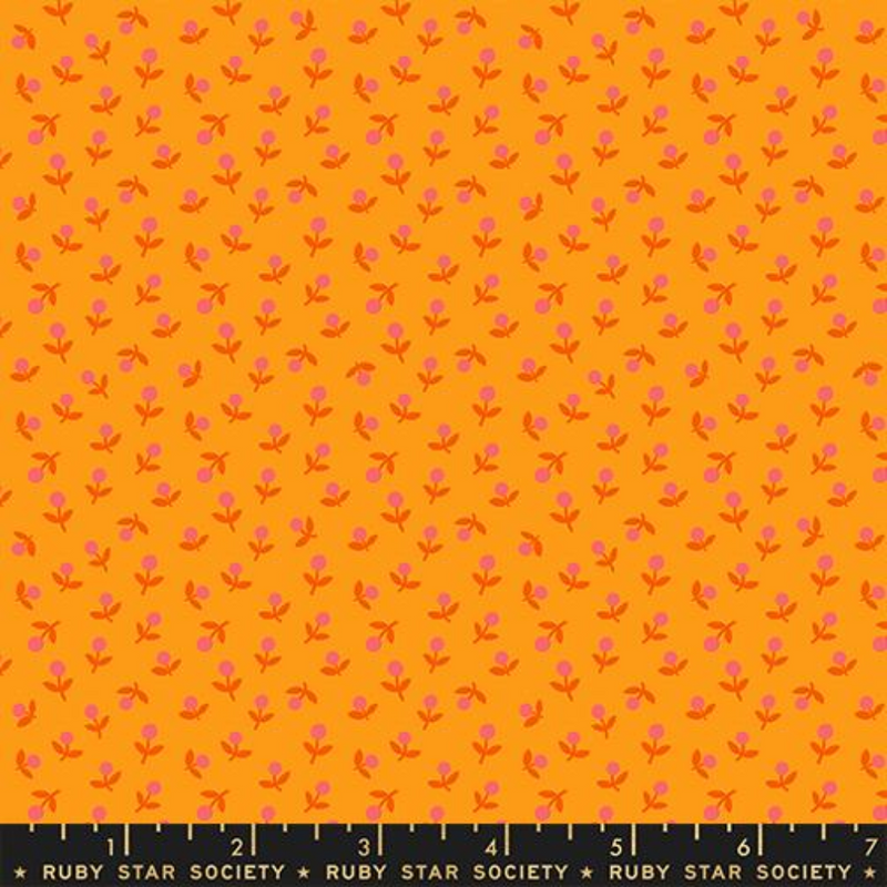 Little pink-petal and red-stemmed flowers are spread out across an orange background.