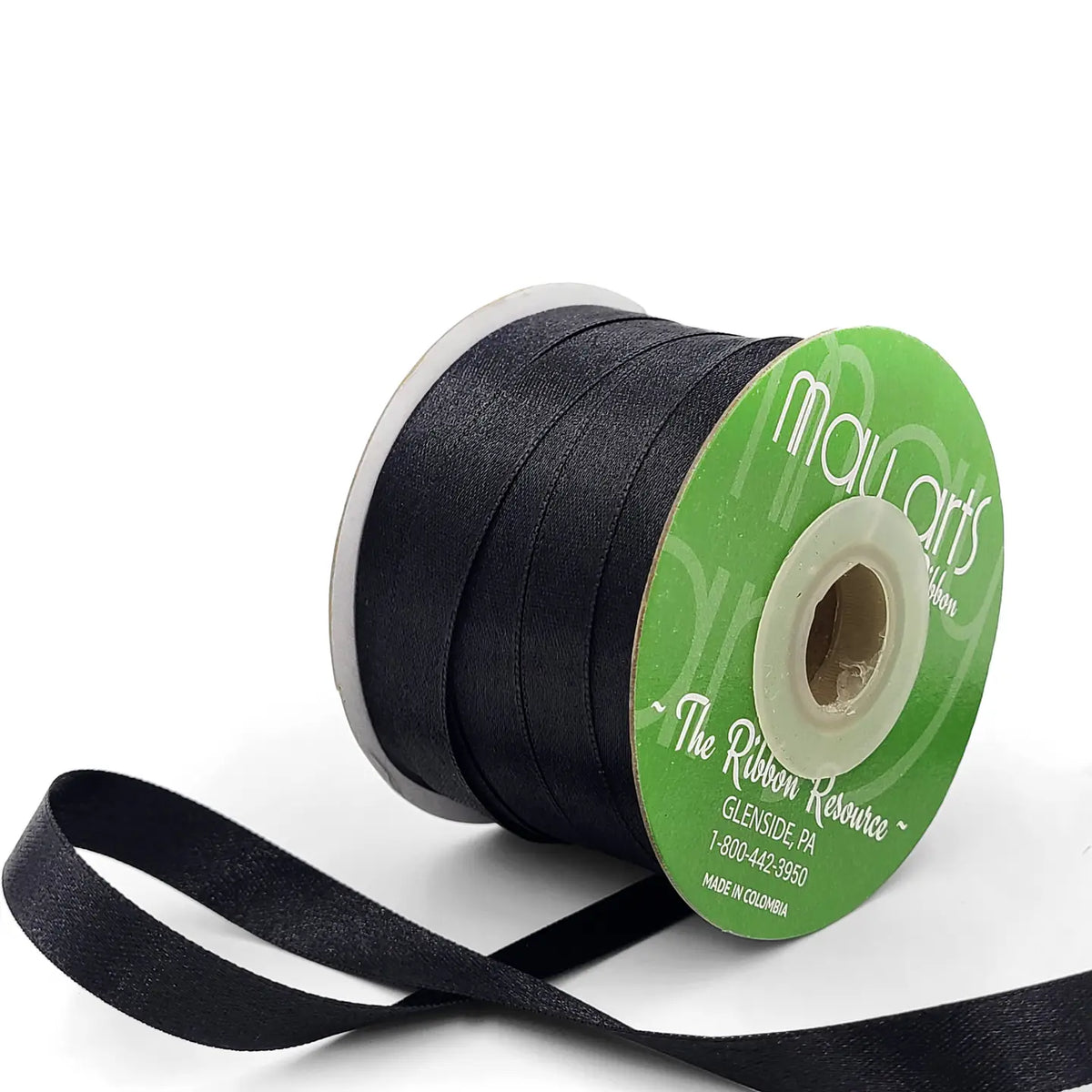 Black ribbon spool with visible brand name on a white background