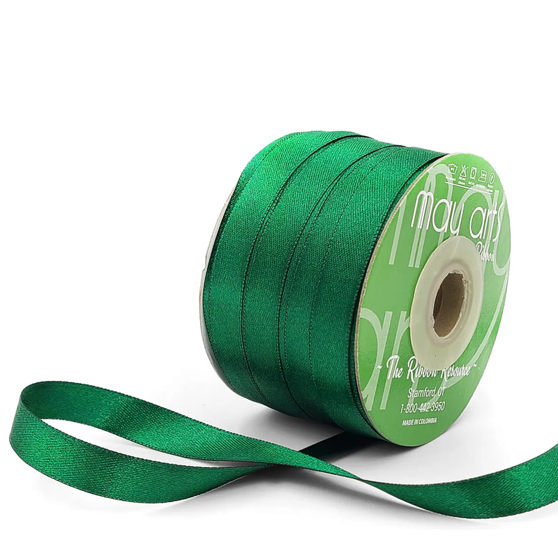 Green ribbon spool with visible brand name on a white background