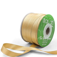 Gold ribbon spool with visible brand name on a white background