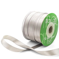 Silver ribbon spool with visible brand name on a white background