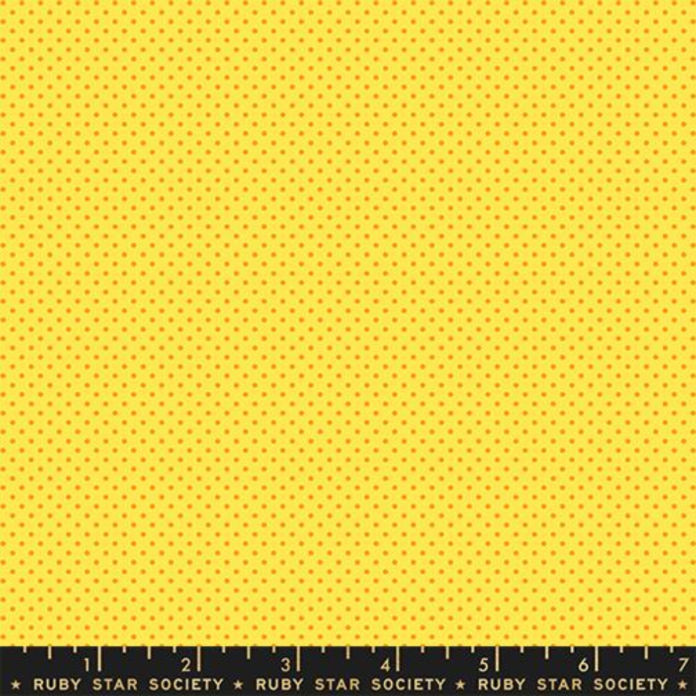 Small orange dots patterned uniformly across a light yellow background.
