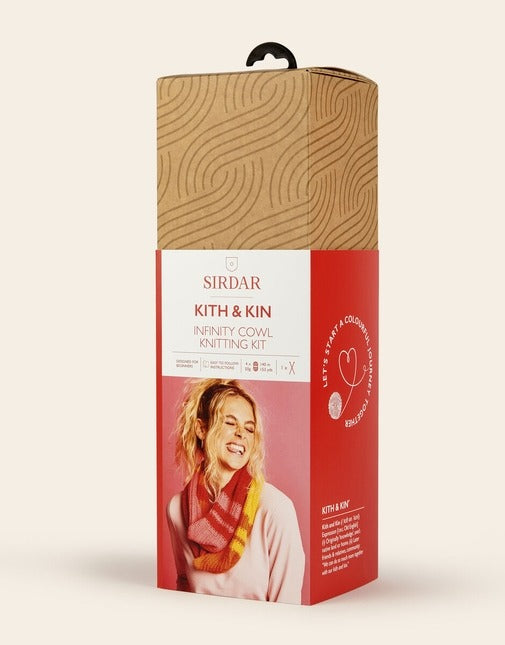 Sirdar Kith & Kin Infinity Cowl Knitting Kit packaging on a beige background