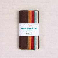 Autumnal felt sheets in a "Wool Blend Felt" label on a white textured background