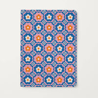 Notebook with a floral pattern on a white background