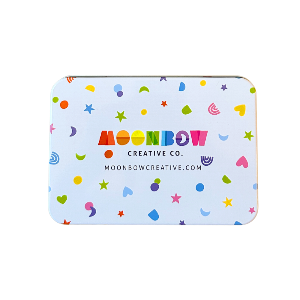 Colorful tin with 'Moonbow Creative Co.' branding on a white background