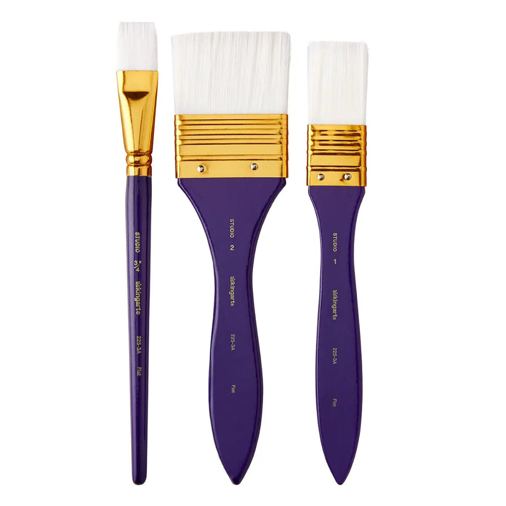3 paint brushes with dark blue handles and white bristles on a white background