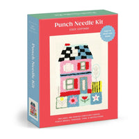 Punch needle kit packaging with a colorful house design on a white background