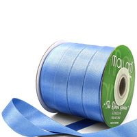 Light blue ribbon spool with visible brand name on a white background