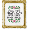 Cross-stitched design with text and floral patterns in a decorative gold frame.