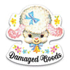 Cartoon character with a bow and flowers, labeled 'Damaged Goods', on a white background