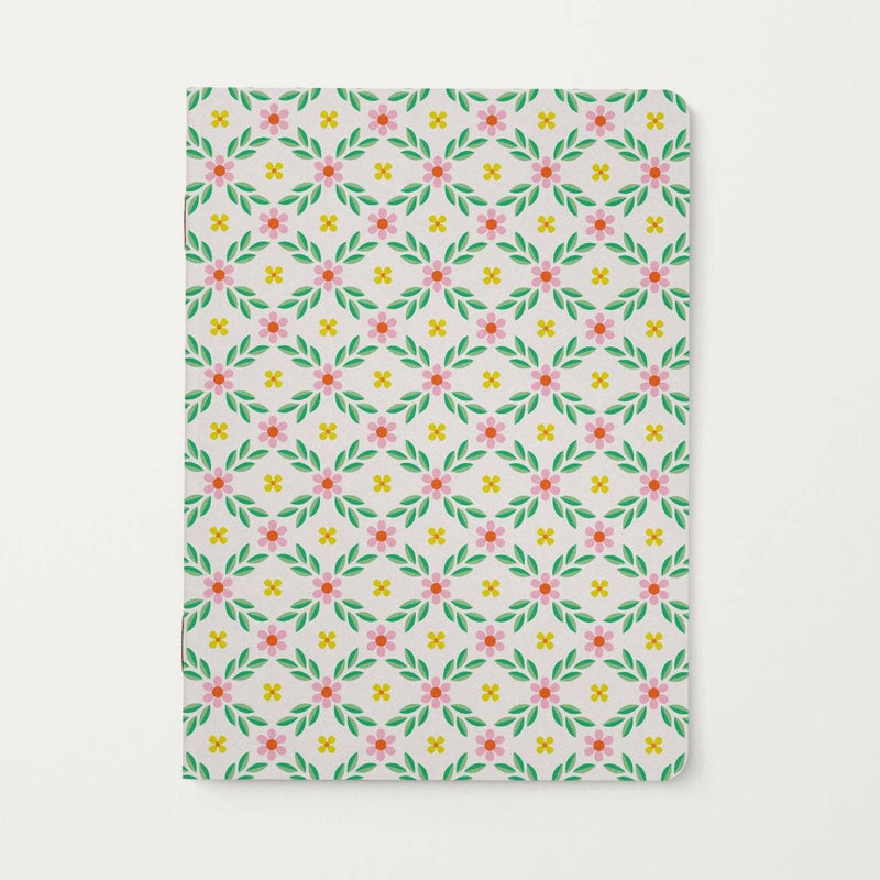 Floral patterned notebook on a white background