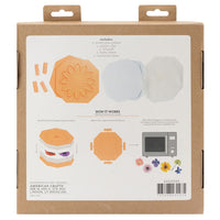 Package of a craft kit with illustrations on the back