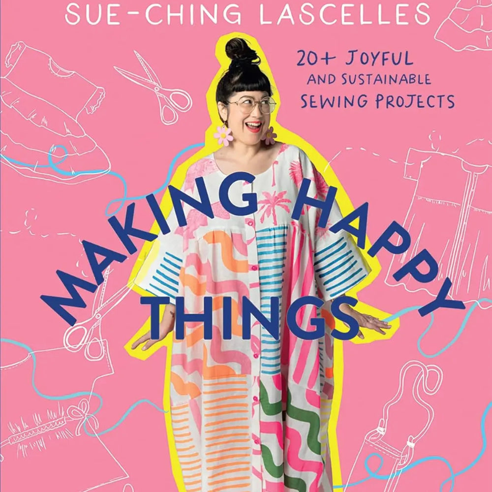 Pink book cover with a woman wearing a colorful dress and "Making Happy Things" written on top of it