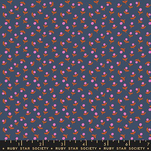 Patterned fabric with pink and orange flowers on a dark blue background, featuring Ruby Star Society label.